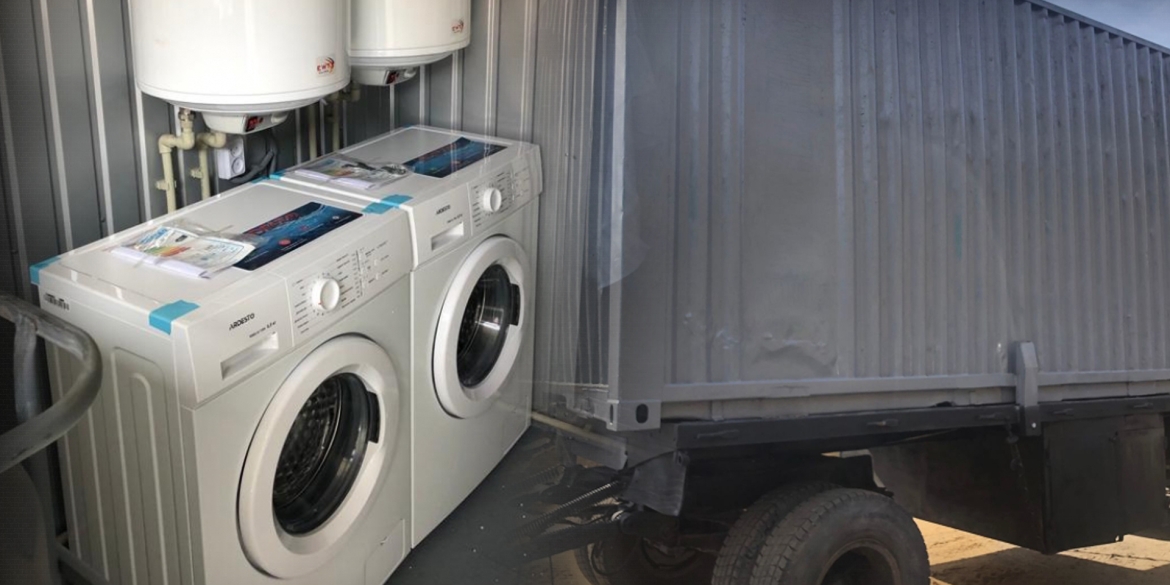 Ямпільська громада передає військовим мобільний банно-пральний комплекс